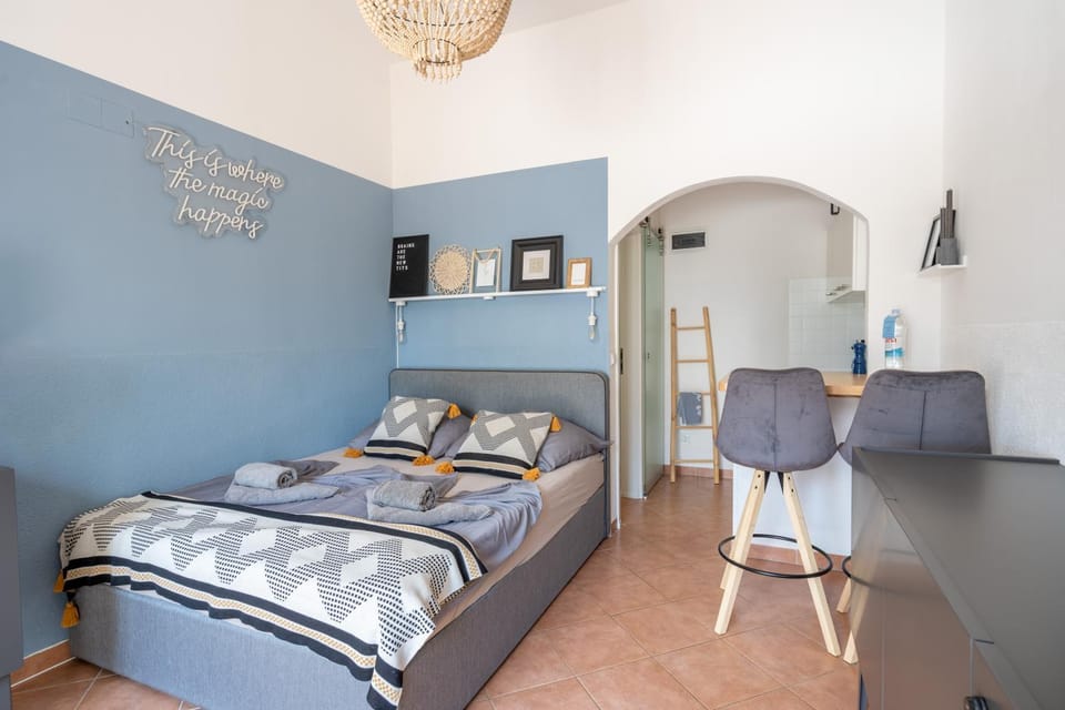 Bed, Living room, Seating area