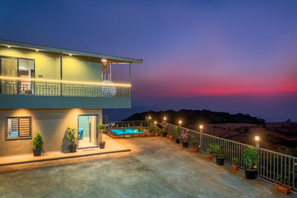 Property building, Patio, Facade/entrance, Night, Natural landscape, View (from property/room), Balcony/Terrace, Pool view, Sunrise, Sunset