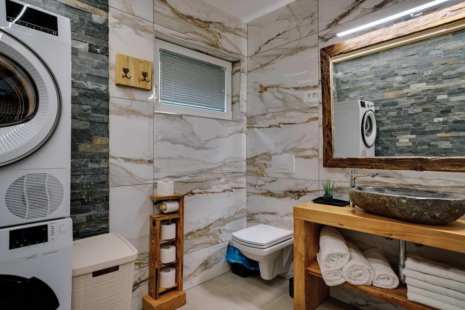 Bathroom, towels, washing machine, dryer