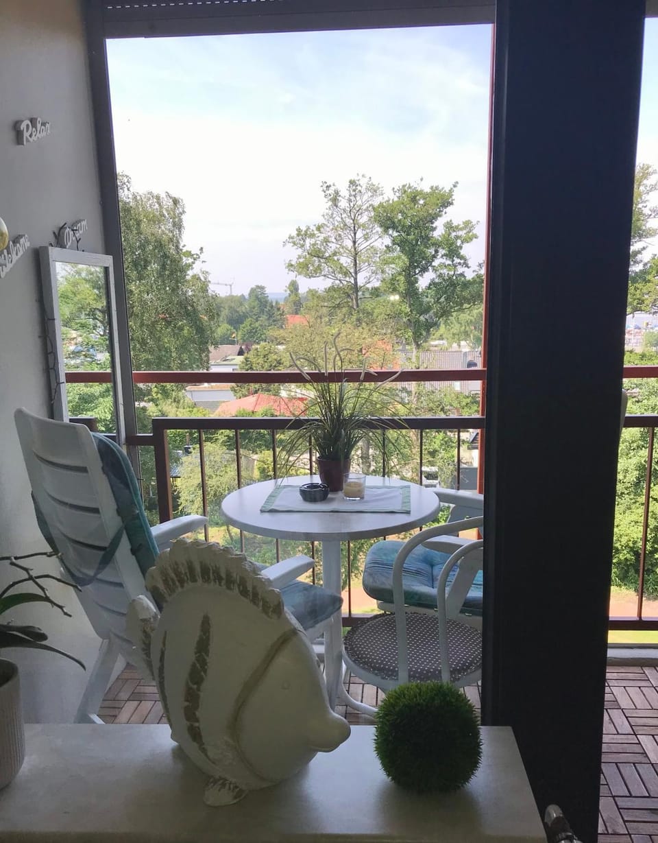 View (from property/room), Balcony/Terrace, Seating area, Garden view