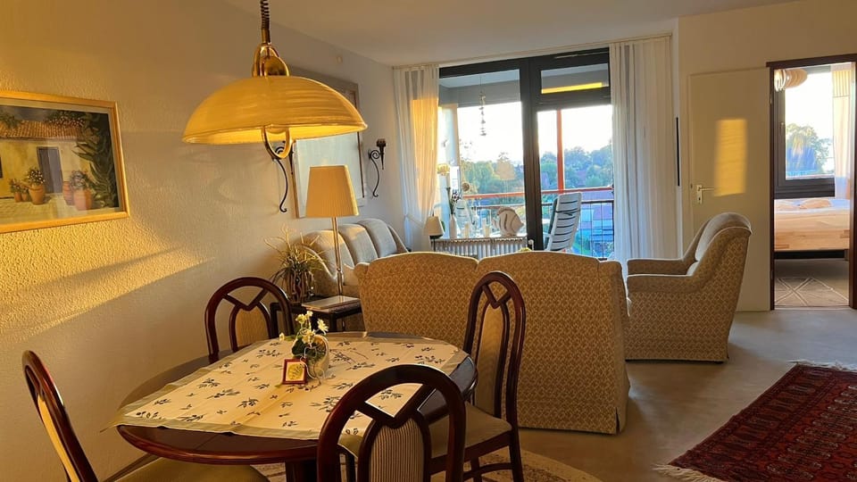 View (from property/room), Living room, Seating area, Dining area, Bedroom, Lake view