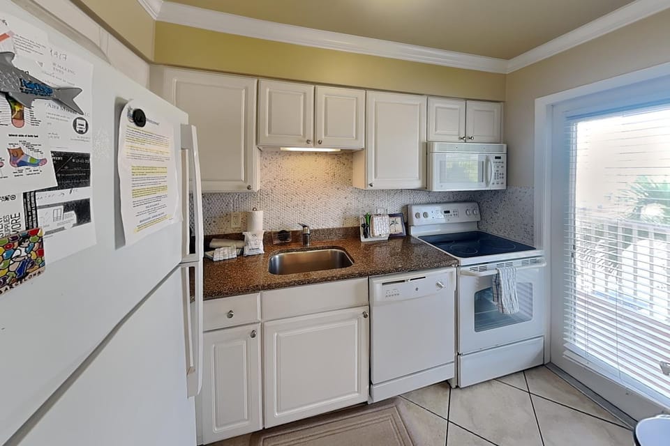 Kitchen or kitchenette, dishwasher, microwave, oven, stove, toaster, kitchen