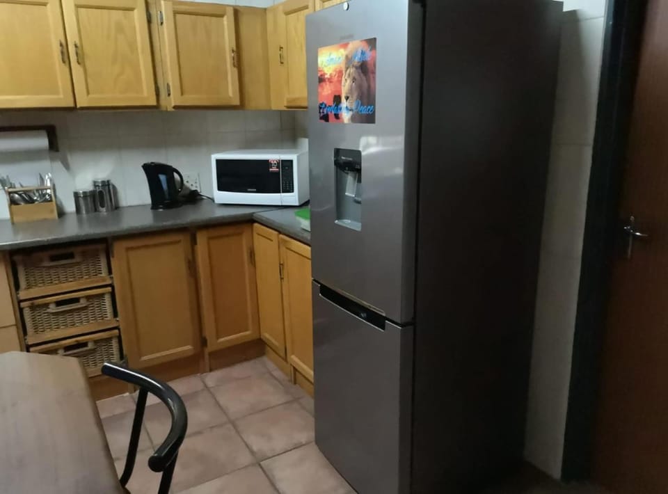 Kitchen or kitchenette, dishwasher, microwave, toaster