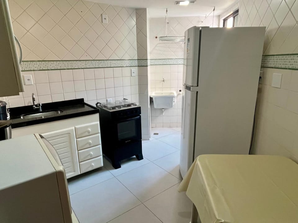 Kitchen or kitchenette, microwave, oven, stove