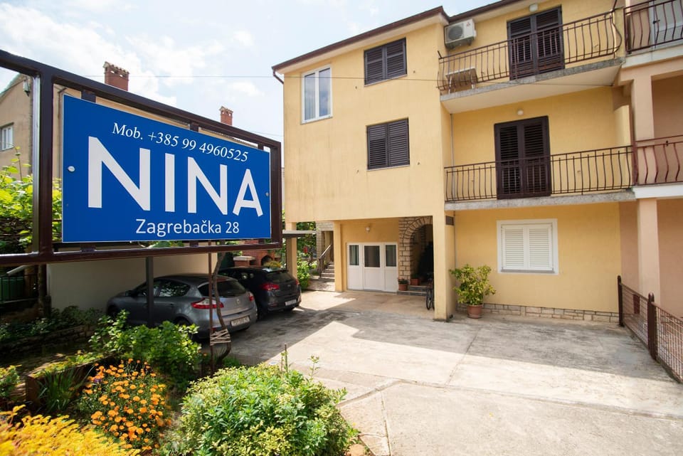 Property building, Facade/entrance, Property logo or sign, Location, Parking