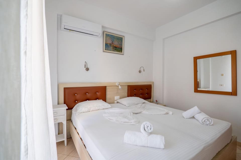 Bed, Photo of the whole room, Bedroom, towels, air conditioner