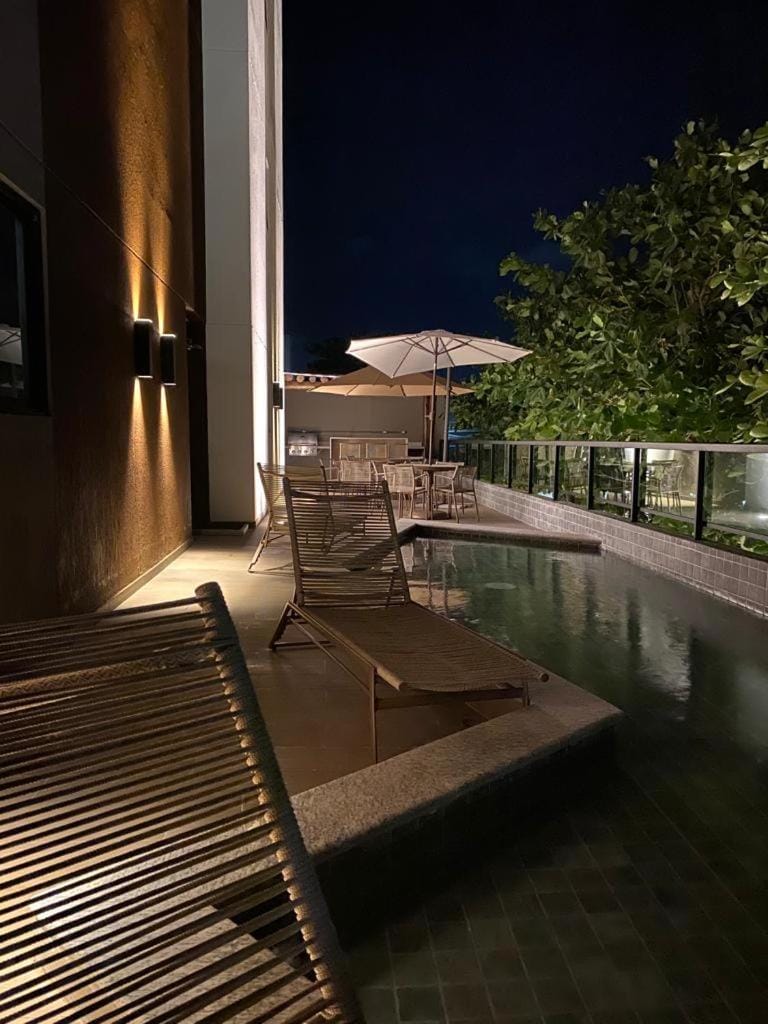 Swimming pool, sunbed