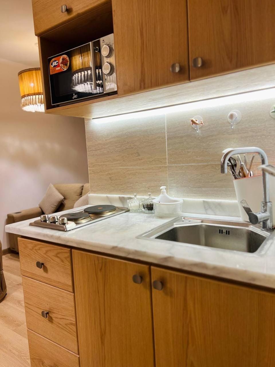 Kitchen or kitchenette, microwave, stove