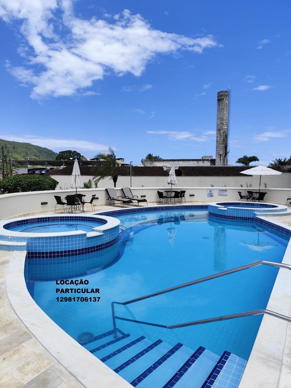 Apto com ar-cond e piscina a 100m mar praia da Enseada Apartment in State of São Paulo