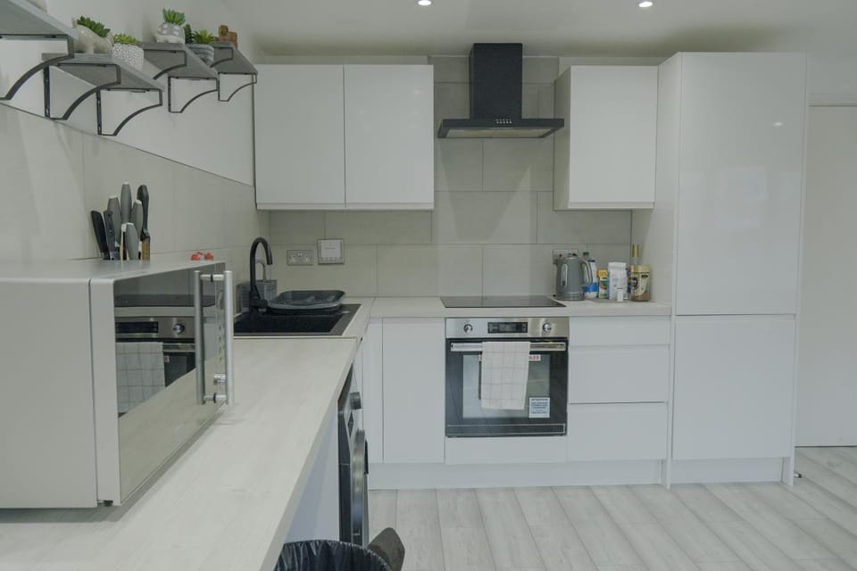 Kitchen or kitchenette, oven, stove