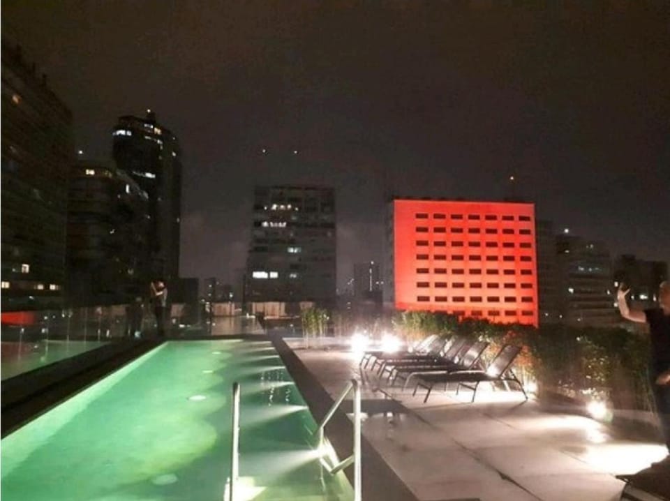 Property building, Night, Pool view, Swimming pool, sunbed