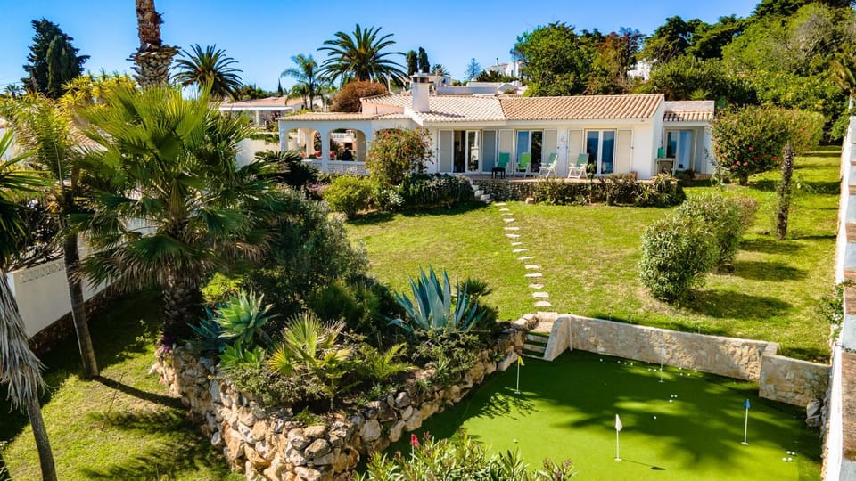 Property building, Patio, Garden, Minigolf