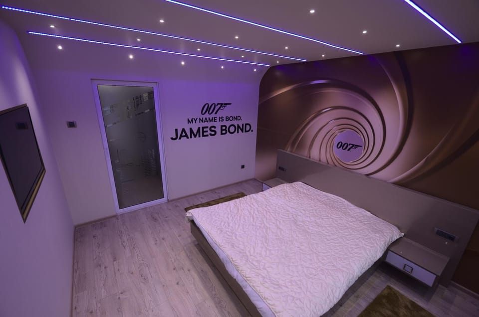 Bed, Property logo or sign, Bedroom