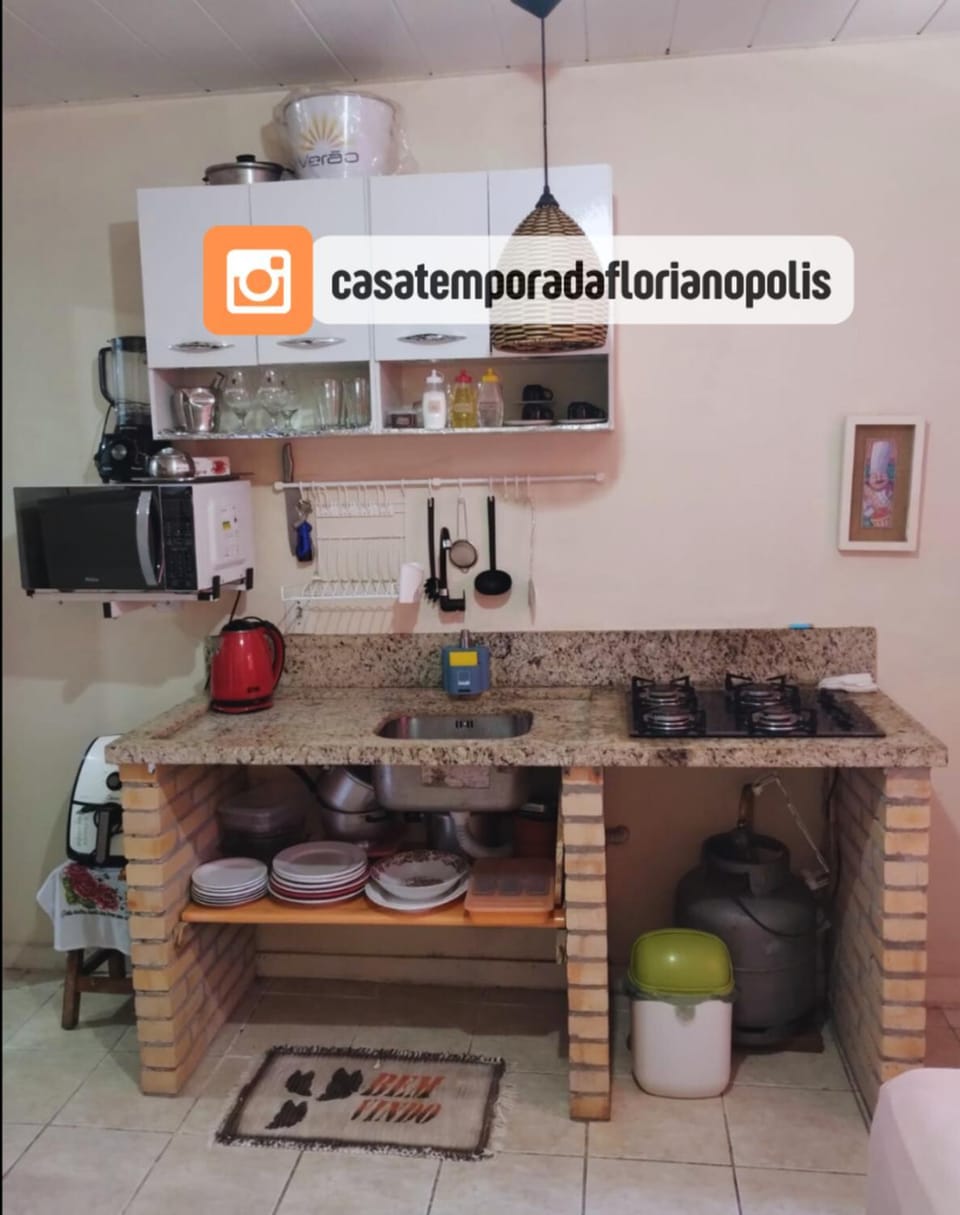 Kitchen or kitchenette, stove, kitchen, air conditioner