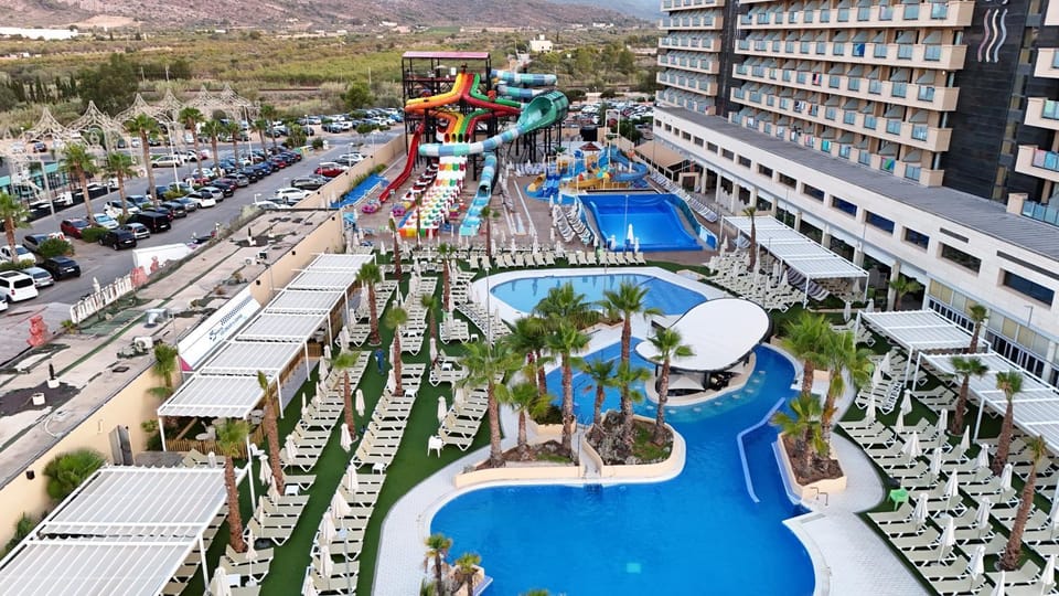 Day, Natural landscape, Bird's eye view, Aqua park, Pool view, Swimming pool, Parking, sunbed