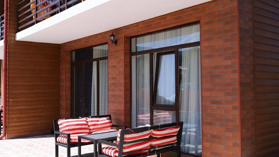Property building, Patio, Day, View (from property/room), Balcony/Terrace, Seating area, sunbed