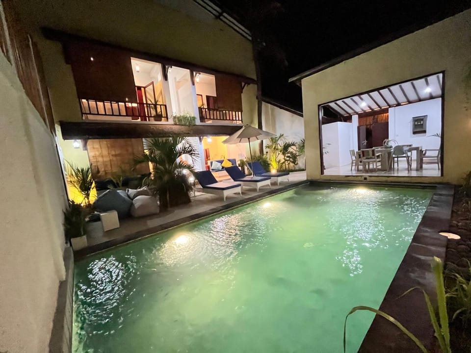 Property building, Patio, Natural landscape, Pool view, sunbed