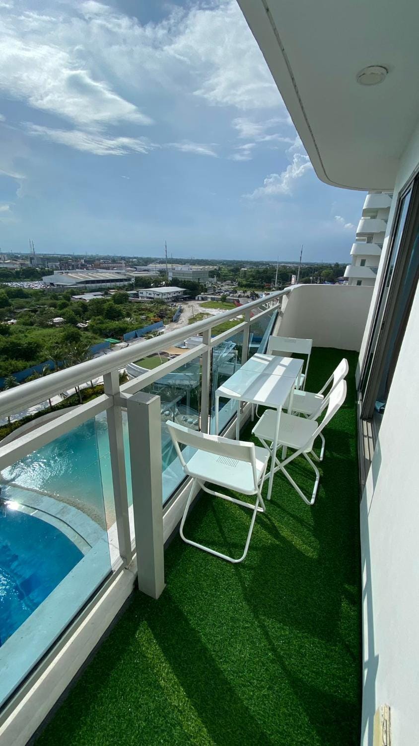 Two Bedroom with Balcony by The Bali Corner at Azure North , POOL and BEACH VIEW - unit with Bathtub Apartment in Calabarzon