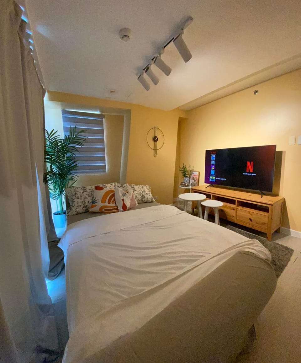 Two Bedroom with Balcony by The Bali Corner at Azure North , POOL and BEACH VIEW - unit with Bathtub Apartment in Calabarzon