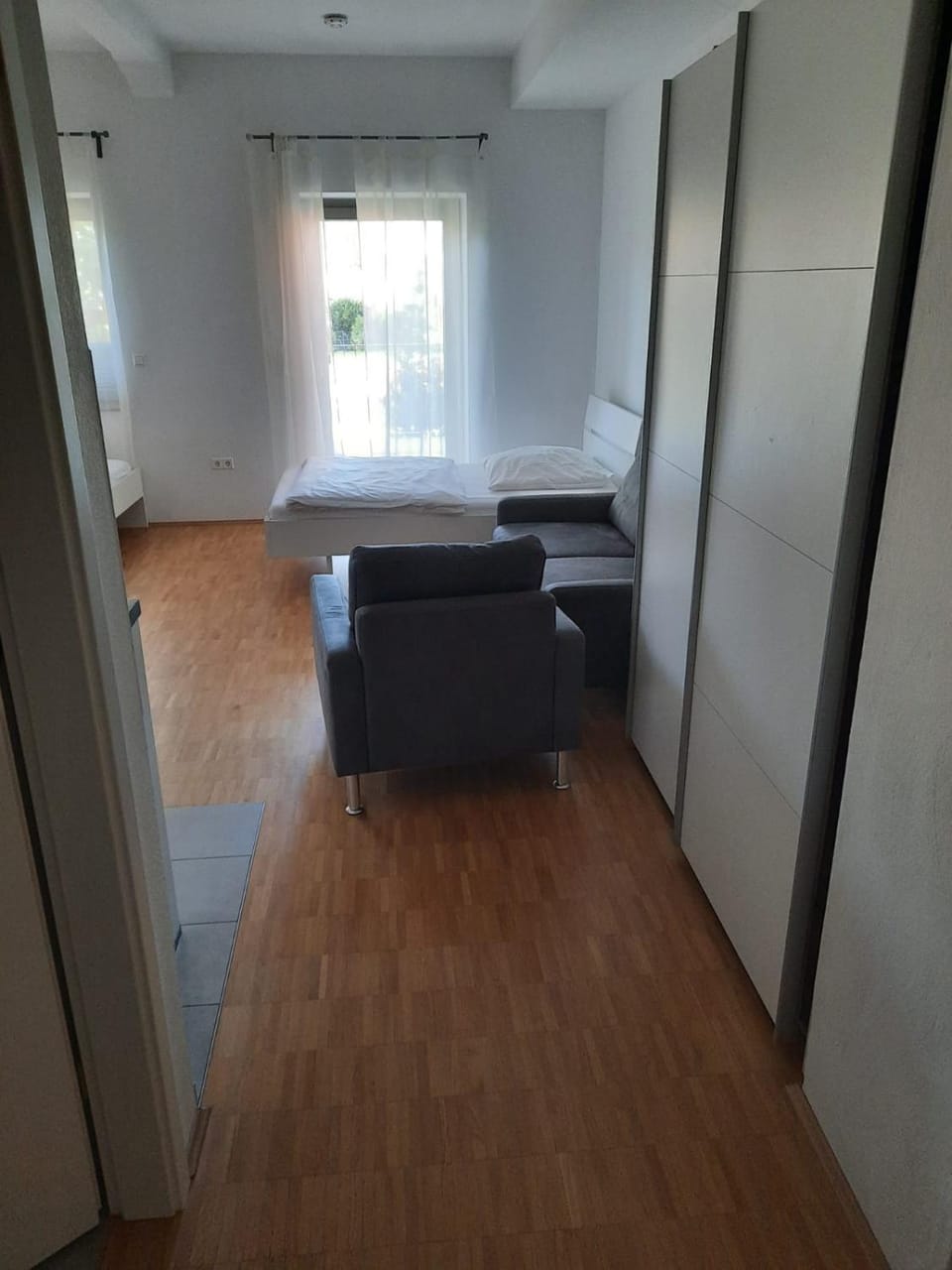 Bed, Seating area, Bedroom