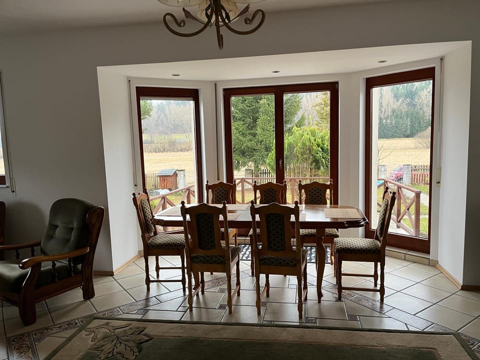 Communal lounge/ TV room, Living room, Dining area, Garden view