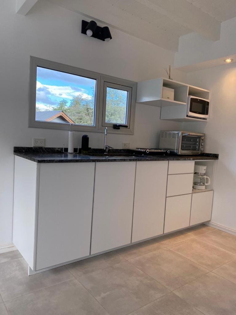 Kitchen or kitchenette, stove
