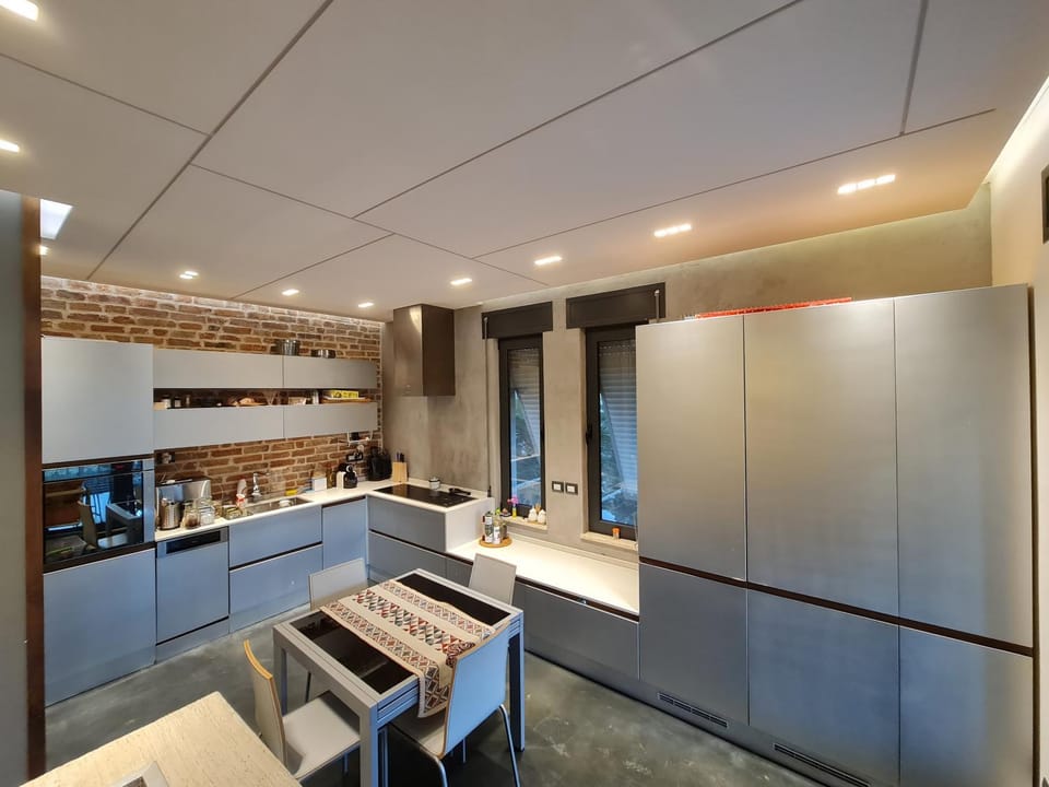 Kitchen or kitchenette, dishwasher, oven, stove