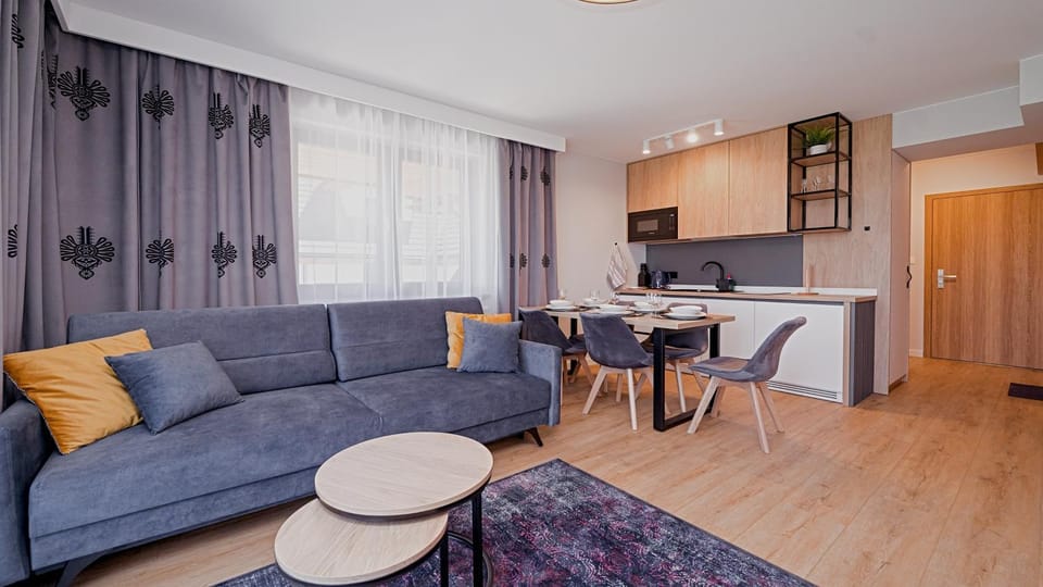 Kitchen or kitchenette, Living room, Seating area, Dining area