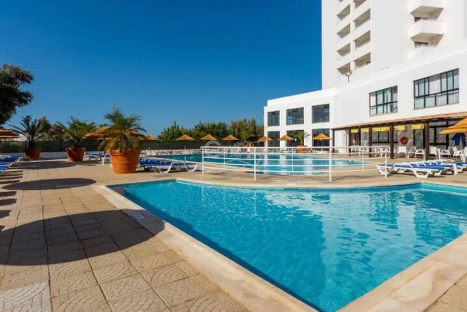 Swimming pool, sunbed