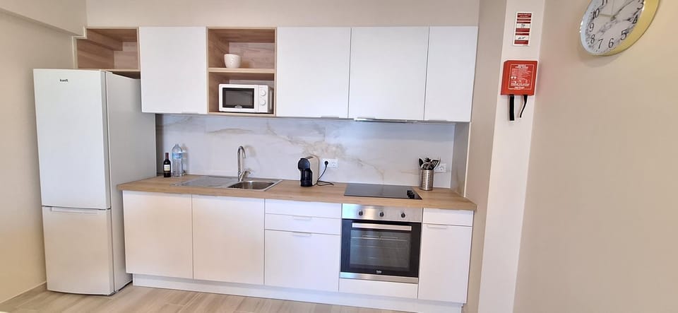 Kitchen or kitchenette, oven, stove, toaster