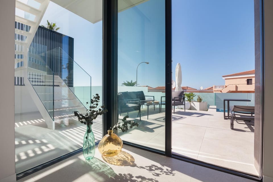 Property building, Patio, Off site, Day, Summer, Garden, View (from property/room), Balcony/Terrace, Living room, Decorative detail, Seating area, Dining area, City view, Pool view, Swimming pool, Seasons, Sunrise, Sunset, sunbed