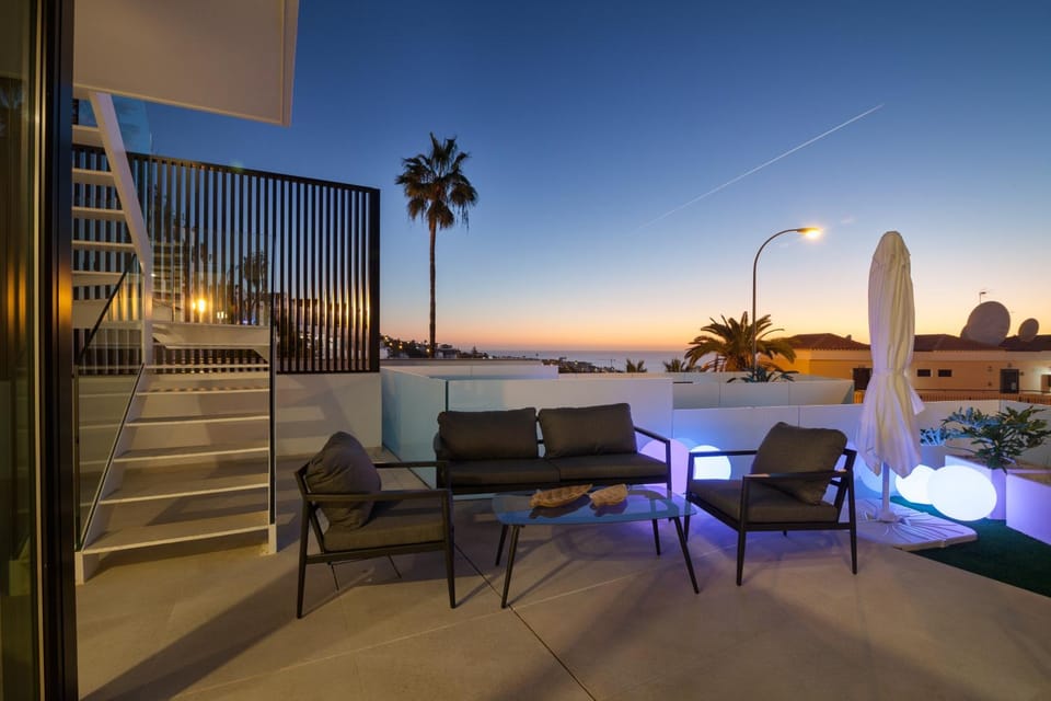 Property building, Patio, Night, Natural landscape, Garden, View (from property/room), Balcony/Terrace, Decorative detail, Seating area, Windsurfing, Sea view, Area and facilities, Swimming pool, Sunset, sunbed