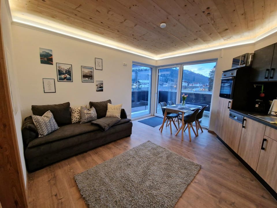 Kitchen or kitchenette, Living room, Seating area, Dining area