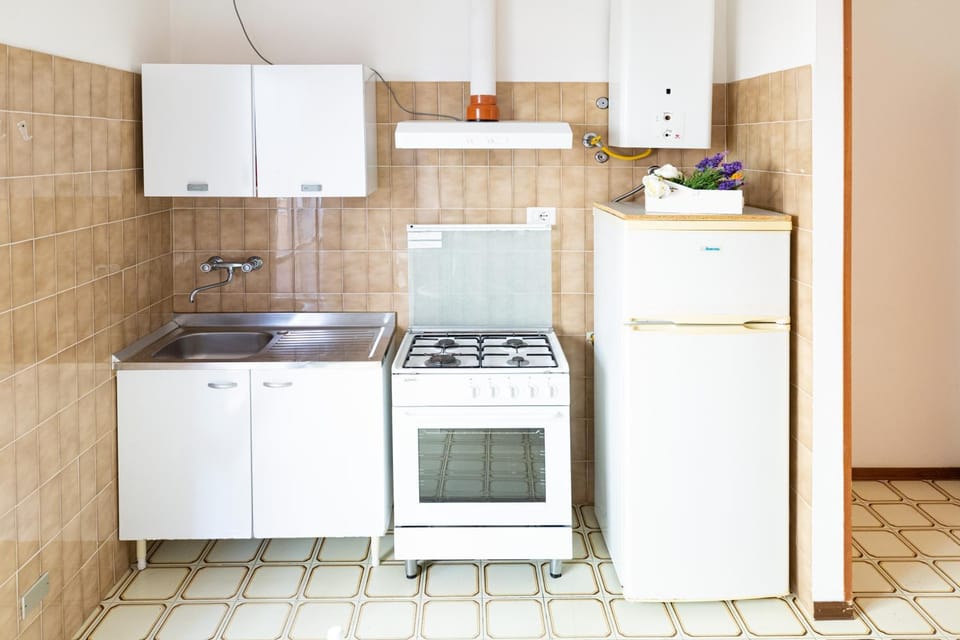 Kitchen or kitchenette, stove