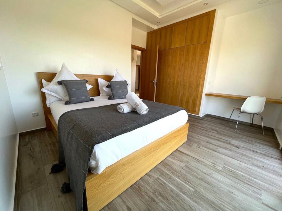 Bed, Seating area, Bedroom, towels, wardrobe