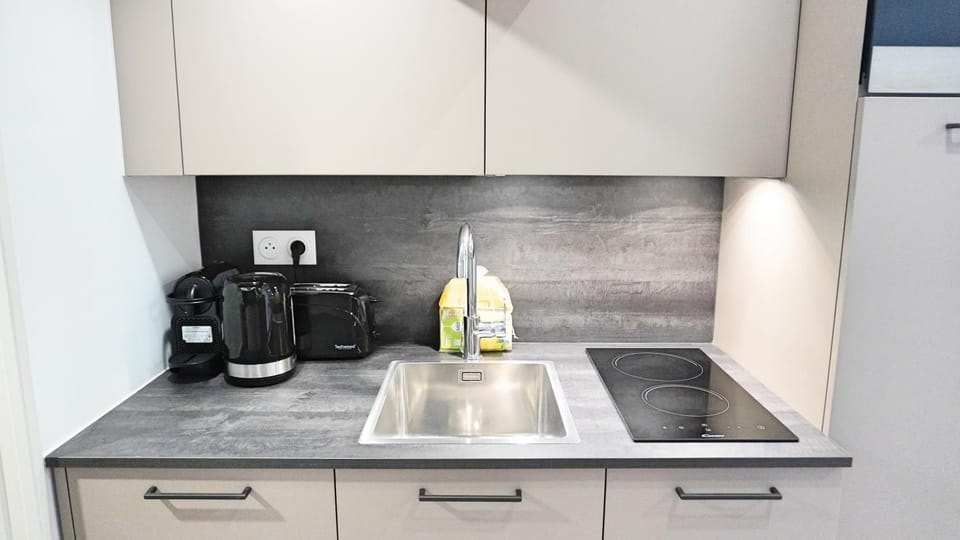 Kitchen or kitchenette, stove