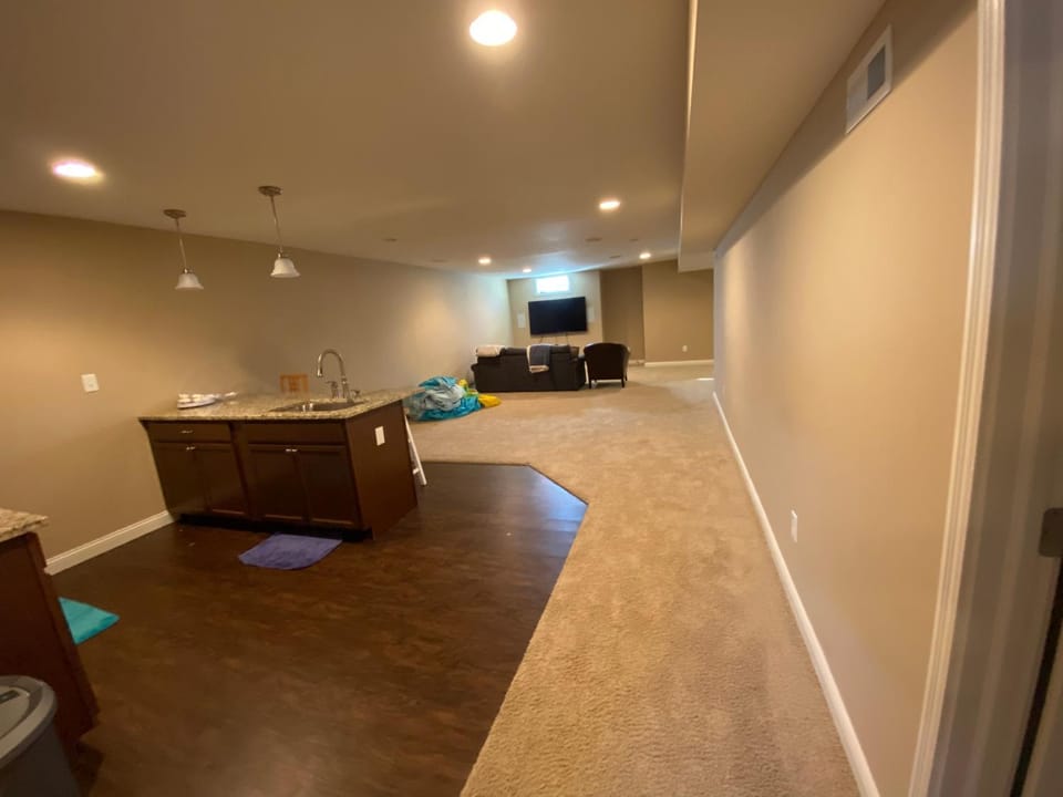 Private basement bedroom with private bathroom, kitchen, and living room with large screen television Vacation rental in Fishers