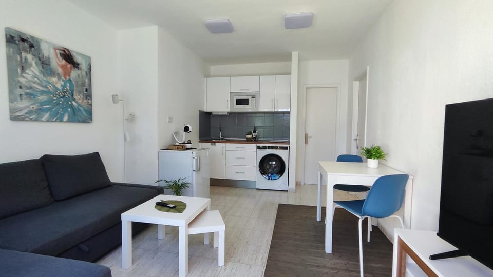 Living room, Dining area, microwave, washing machine, kitchen
