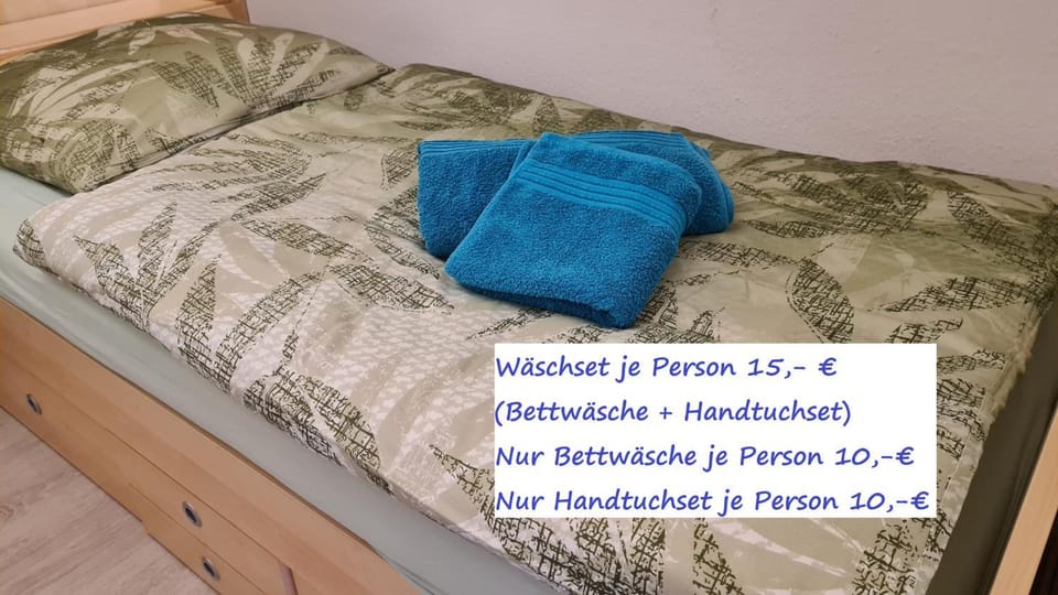 Bed, Bedroom, Text overlay, towels