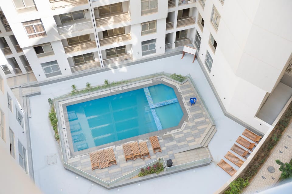 Property building, Day, View (from property/room), Pool view, Swimming pool
