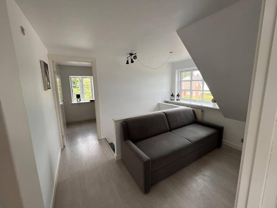 Bed, Living room, Seating area, Bedroom