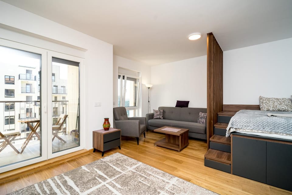 Bed, Living room, Seating area, Bedroom