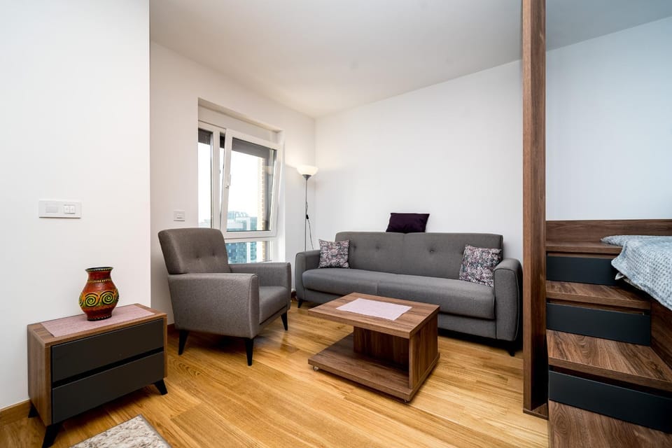 Bed, Living room, Seating area, Bedroom