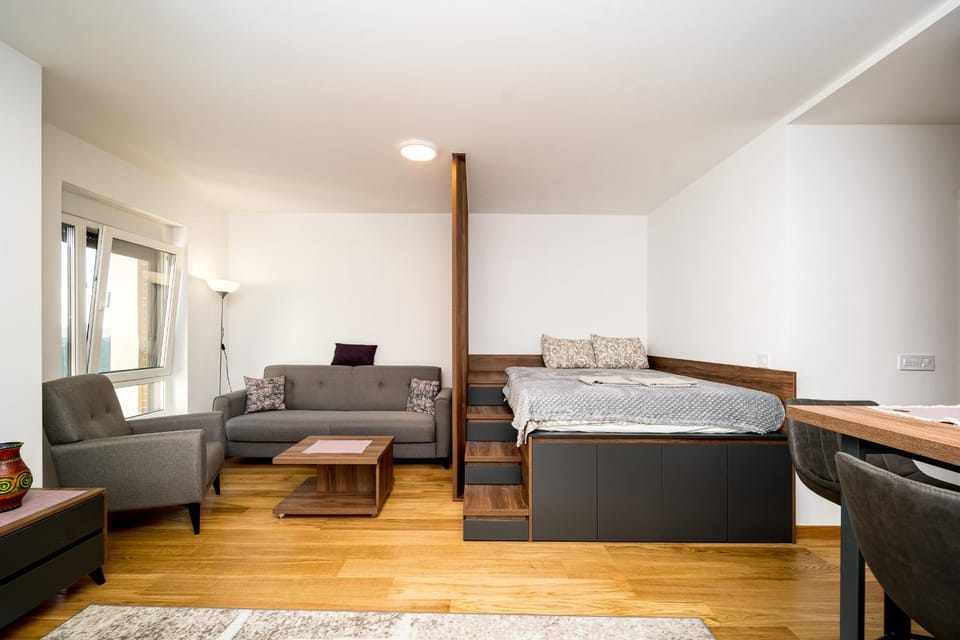 Bed, Living room, Seating area, Bedroom