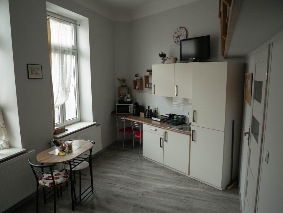 Kitchen or kitchenette, stove
