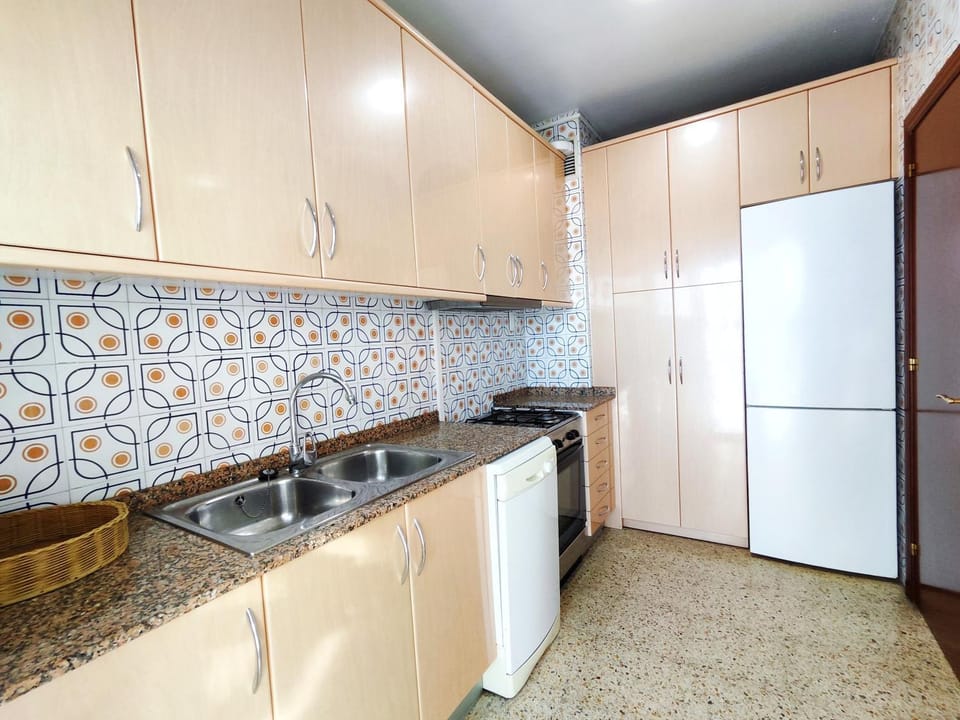 Kitchen or kitchenette, oven, stove