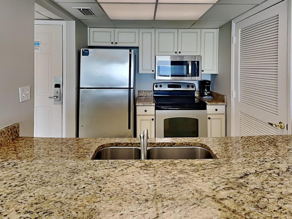 Kitchen or kitchenette, microwave, oven, stove, kitchen