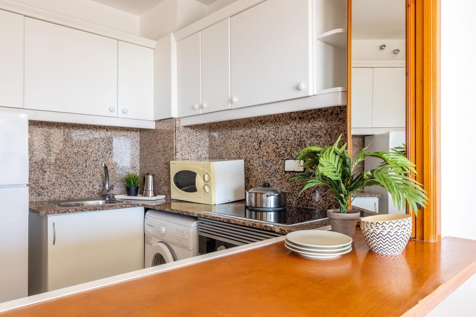 Kitchen or kitchenette, stove, kitchen