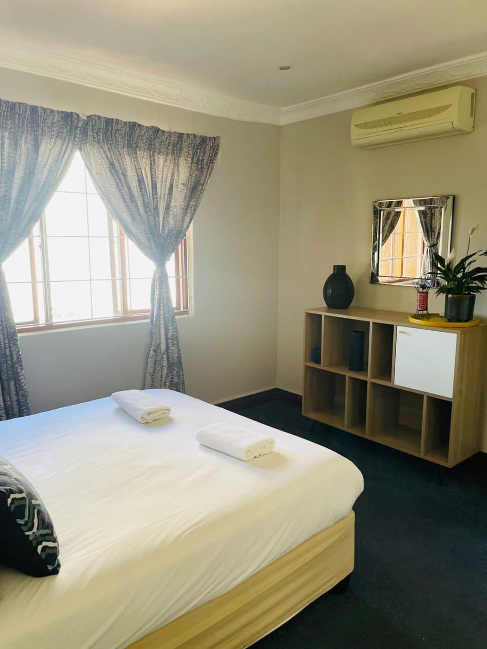 Bed, Photo of the whole room, Bedroom, towels, air conditioner