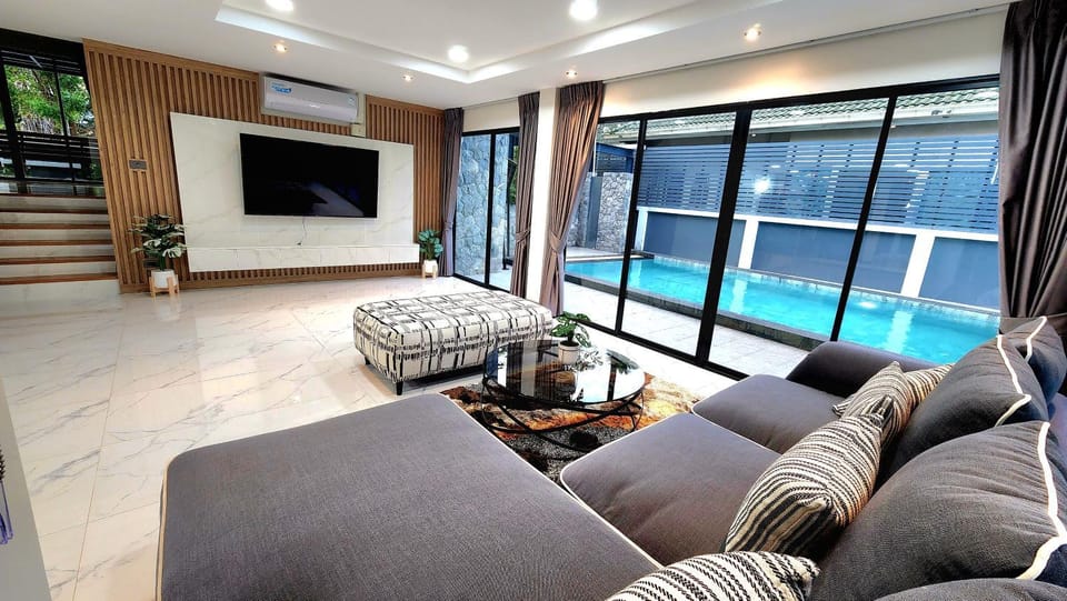 TV and multimedia, Living room, Seating area, Pool view, Swimming pool